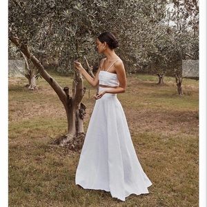 Brand new-only tried on. Brand: DISSH.Size two top, size 4 skirt.Colour: white